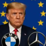 Symbolbild: BMW- und Mercedes-Logos vor EU-Flagge – Konflikt um Trump-Zölle
