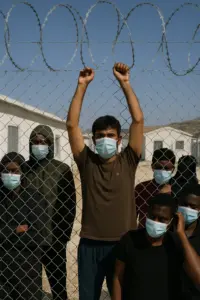 Symbolbild: Migranten auf Kreta unter Bewachung der Küstenwache