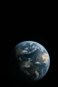 Künstlerische Darstellung eines außerirdischen Signals, das die Erde erreicht – Symbolbild für das Fermi-Paradoxon.